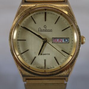 Armitron Quartz Day-Date Watch – Pre-Owned, New Battery, Round, Gold